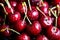 Sweet cherry antioxidant, natural, vitamin, organic berry. Macro photo, close-up. Drops of water on the surface of