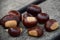Sweet chestnuts on wooden planks