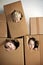 Sweet children,  boy brothers, hiding in cardboard box, looking out, isolated, sad kids, staying at home, due to quarantine