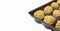 Sweet chocolate balls in plastic package. Yellow candy pralines. Template/mockup image