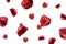 Sweet chocolate heart shaped candy wrapped in red foil papper on white background. Flying candy heart shaped.