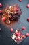 Sweet chocolate slices with fruits, cocoa powder and chocolate topping. sweet dessert on black background, image for patisserie