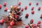 Sweet chocolate slices with fruits, cocoa powder and chocolate topping. sweet dessert on black background, image for patisserie