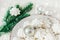 Sweet christmas background with airy meringues ,fir branch,silver balls,plate.Wooden table