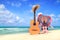 Sweet classic guitar and pink ukulele,hat, headphones,football.