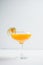 Sweet cocktail with peach liquor and physalis