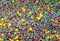 Sweet colorful confectionery sprinkling texture with yellow stars