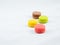 Sweet and Colorful four macaroons lying togehter