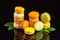 Sweet and colorful french macaroons.Banner of multicolored macaroons on a black background with fresh leaves.Kopy space