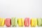 Sweet colorful macarons isolated on white background. Tasty colourful macaroons. High quality photo