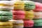 Sweet colorful macaroons as wallpaper.