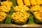 Sweet corn with butter grilled on the charcoal stove in the market.Thailand