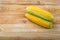 Sweet Corn Ears on Wooden Desk