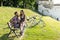 Sweet couple drinking coffee in park