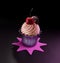 Sweet Creamy Cupcake with Topping on the black background