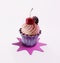 Sweet Creamy Cupcake with Topping on the charcoal white background