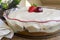 Sweet creamy dessert with soft fluffy sponge cake, berries and custard. Homemade cherry cake