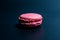 Sweet and delicate macaroon cookies on a black background