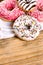 Sweet, delicious donuts on on rustic table - American donut