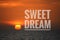 Sweet dream wording written on beautiful sunset background