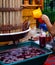 Sweet drink made from grape juice. Fresh cold pressed grape juice made during food festival
