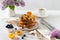 Sweet french toast with berries and honey served on plate. Copy space for text. Healthy breakfast: toasts with blueberry and