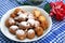 Sweet fritter balls powdered with icing sugar