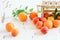 Sweet fruits apricots, wooden box on the rustic wood background. Healthy natural eating