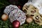 Sweet German bread with raisins and icing sugar and Christmas decoration