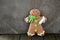 Sweet gingerbread man on the wooden boards