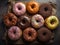 Sweet glazed doughnuts assorted closeup background. Delicious dessert from bakery for National Donut Day. Generative AI