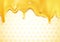 Sweet gold dripping honey on honeycomb background