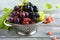 Sweet grapes in a metal colander