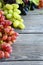 Sweet grapes on wooden boards