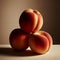 Sweet Harmony: Three Peaches Stacked in Delicate Balance.