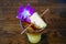 Sweet Hawaiian Mai Tai cocktail with an orchid flower