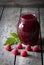 Sweet homemade organic raspberry jam in mason jar