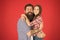 Sweet hug. Man bearded father and cute little girl daughter on red background. Celebrate fathers day. Family values