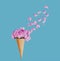 Sweet image of mini cone and pink flowers petals as ice cream over blue background