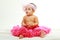 Sweet infant wearing a pink tutu