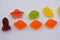 Sweet jelly candies, sweets in the form of aliens space rockets, astronauts, alien ships and planet, asteroids.