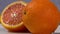 Sweet, juicy oranges in water drops on a light background