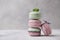 Sweet lavander, mint and pistachio macaroons on light background