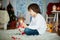 Sweet little boy, breaking his piggy bank to buy present for Christmas