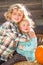 Sweet Little Boy Hugs His Baby Sister in a Rustic Ranch Setting at the Pumpkin Patch