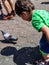 Sweet little boy playing with Pigeon near Batu Caves temple in Malaysia, Baby boy playing with pigeons