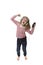 sweet little girl with blonde hair listening to music with headphones and mobile phone singing and dancing happy