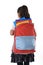 Sweet little girl carrying very heavy backpack or schoolbag full of school material