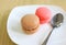 Sweet macaron with spoon