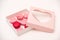 Sweet macarons in gift box. Traditional french colorful macarons. Valentine`s day gift. Pink macarons in the heart shape